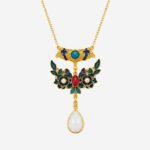 Verdant Bloom Cold Enamel Necklace with green floral motif and white jade-style teardrop pendant