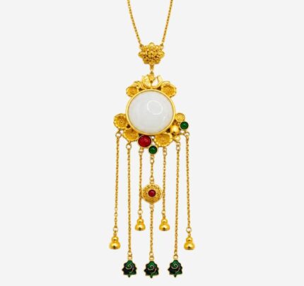 Imperial Radiance Necklace with large white jade center, gold floral frame, and multi-strand golden tassels