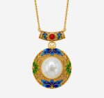 Azure Moonlight Cold Enamel Necklace with round white jade center and teal floral filigree accents