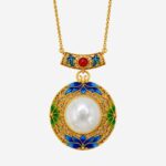 Azure Moonlight Cold Enamel Necklace with round white jade center and teal floral filigree accents