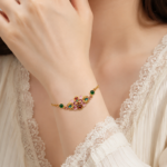 Rosy Orchard Radiance: Cold Enamel Filigree Bracelet – Multi-Gem Floral Medallion with Emerald-Green Accents