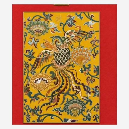 Close-up detail of Chinese silk brocade phoenix and floral pattern