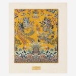 Detail of dragon and phoenix Chinese silk brocade artwork on gold ground