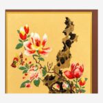 Close-up detail of Chinese silk brocade flower rock and moon artwork