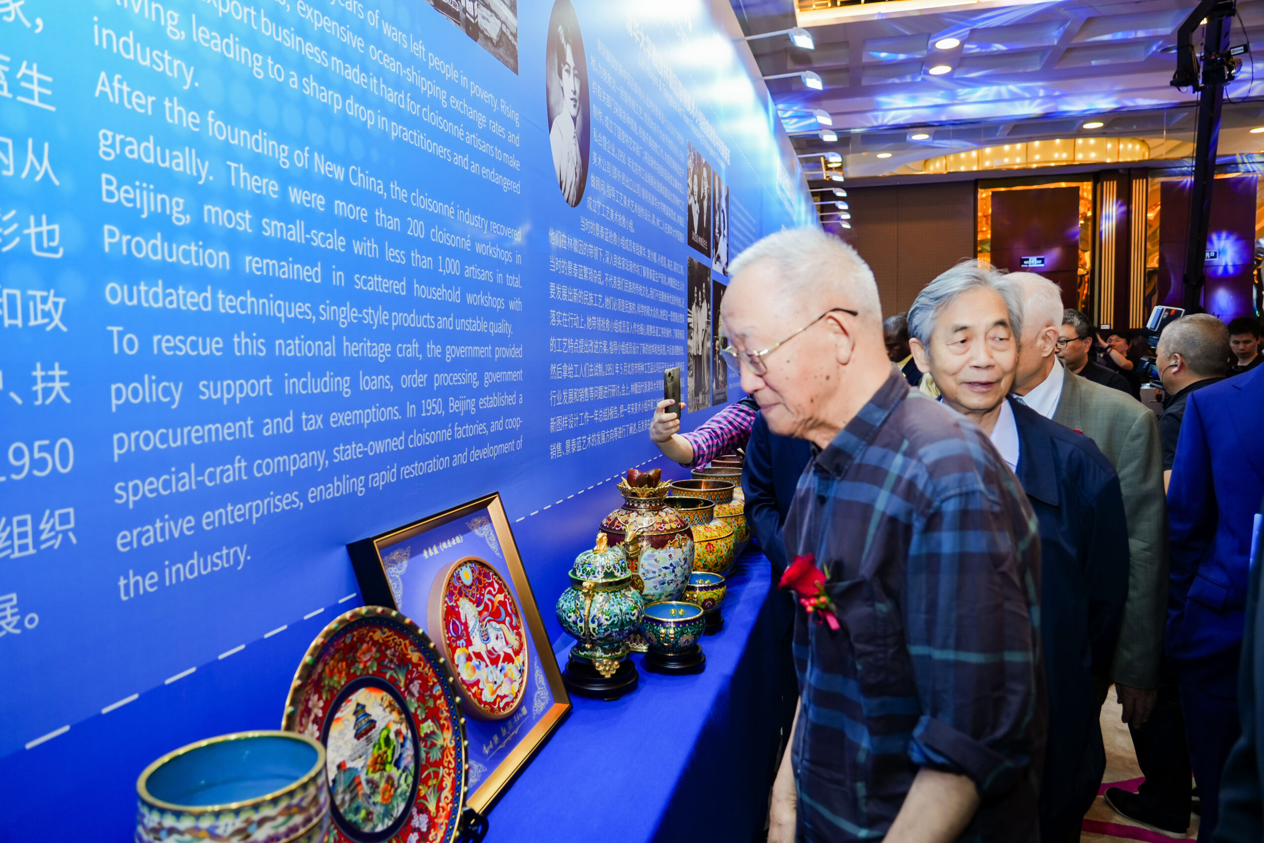 Cultural display featuring Chinese enamel and cloisonne-inspired works